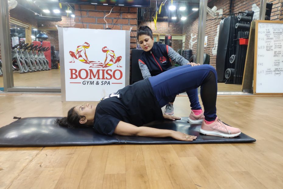 BOMISO's Personal Female Coach giving Physio training to the new Mom